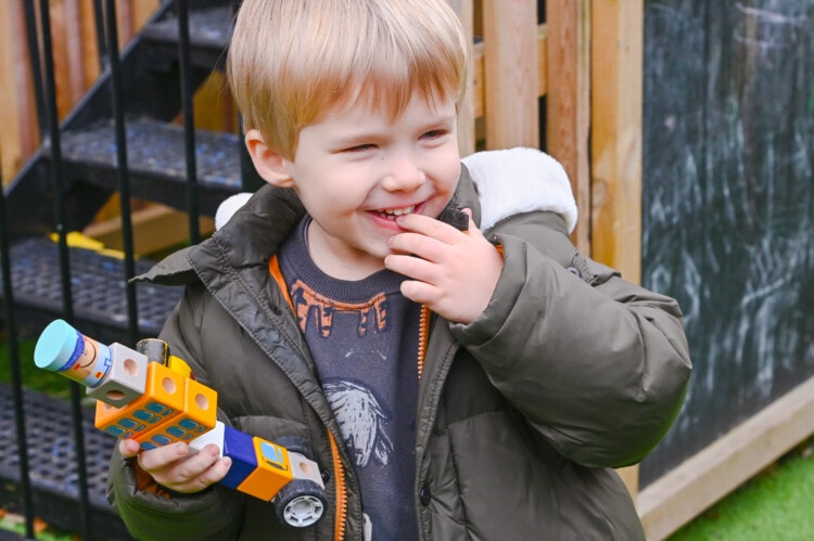 Happy child playing at nursery